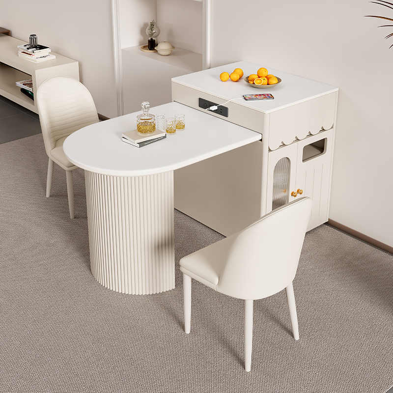 Cream wind rock slab island table integrated into a modern simple retractable home restaurant kitchen for small households