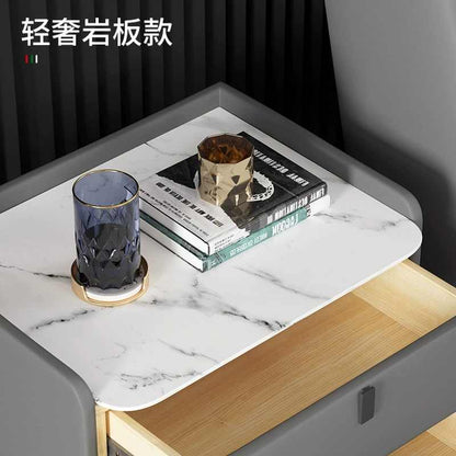 All solid wood bedside cabinet light luxury rock board storage cabinet Bedroom simple modern bedside cabinet leather small apartment storage cabinet