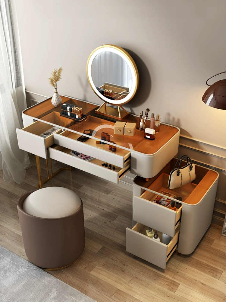 Light luxury dressing table advanced sense tempered glass Italian minimalist designer solid wood makeup table bucket cabinet one