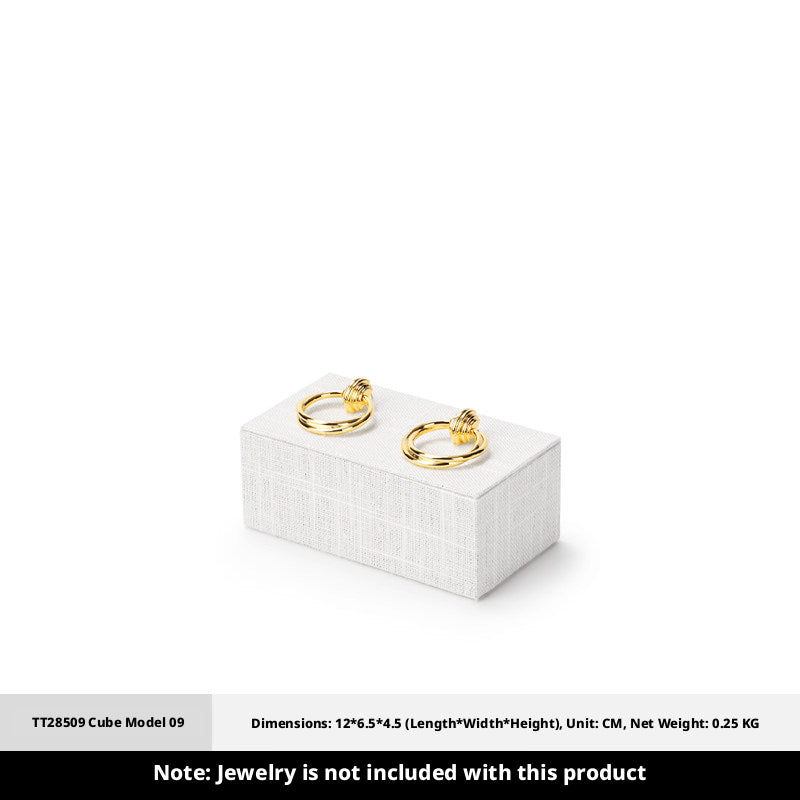White Linen Jewelry Display Set with Multi-Level Risers for Vendors