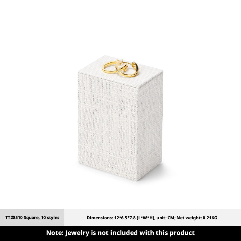 White Linen Jewelry Display Set with Multi-Level Risers for Vendors