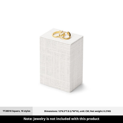 White Linen Jewelry Display Set with Multi-Level Risers for Vendors