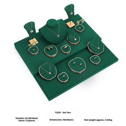 Green Suede and Gold Jewelry Showcase Trays and Necklace Busts
