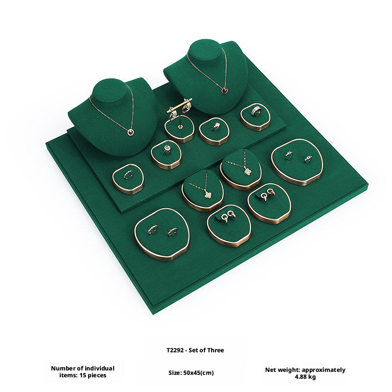 Green Suede and Gold Jewelry Showcase Trays and Necklace Busts