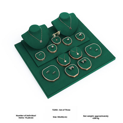 Green Suede and Gold Jewelry Showcase Trays and Necklace Busts