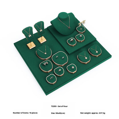 Green Suede and Gold Jewelry Showcase Trays and Necklace Busts