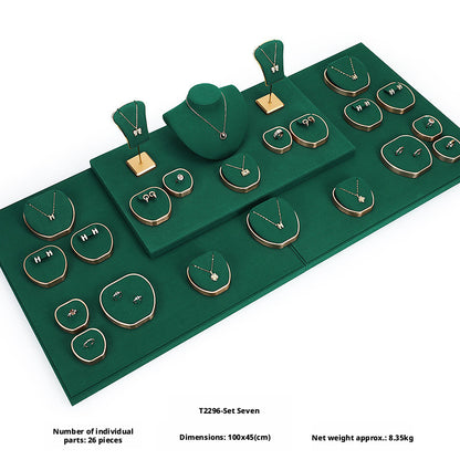 Green Suede and Gold Jewelry Showcase Trays and Necklace Busts