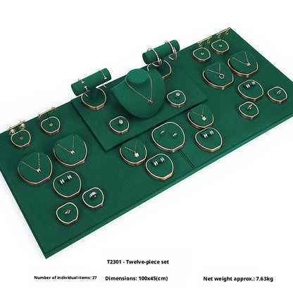 Green Suede and Gold Jewelry Showcase Trays and Necklace Busts