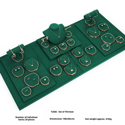 Green Suede and Gold Jewelry Showcase Trays and Necklace Busts