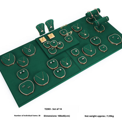 Green Suede and Gold Jewelry Showcase Trays and Necklace Busts