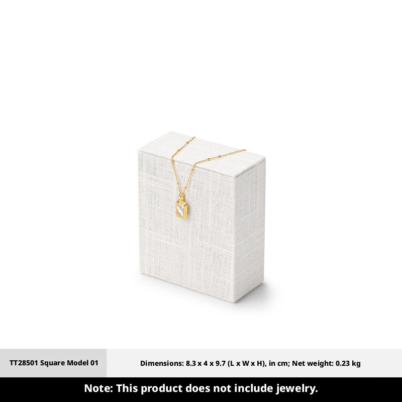 White Linen Jewelry Display Set with Multi-Level Risers for Vendors