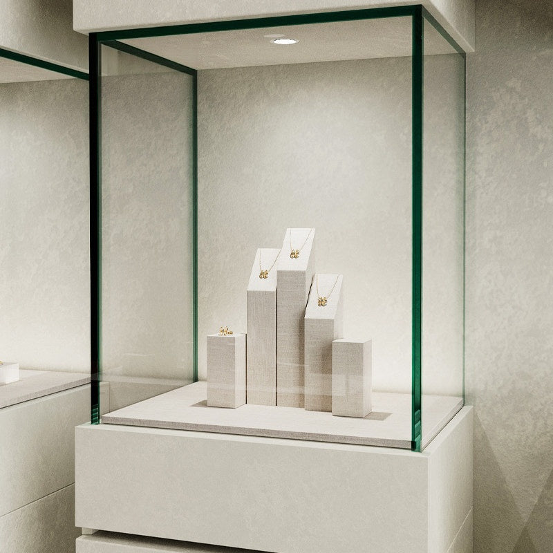 White Linen Jewelry Display Set with Multi-Level Risers for Vendors