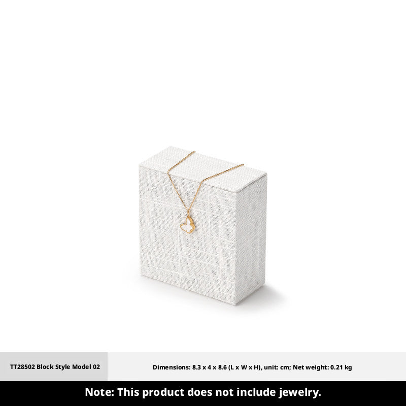 White Linen Jewelry Display Set with Multi-Level Risers for Vendors