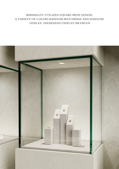 White Linen Jewelry Display Set with Multi-Level Risers for Vendors