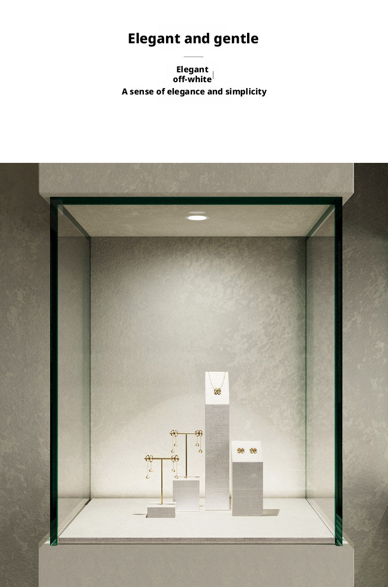 White Linen Jewelry Display Set with Multi-Level Risers for Vendors