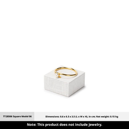 White Linen Jewelry Display Set with Multi-Level Risers for Vendors