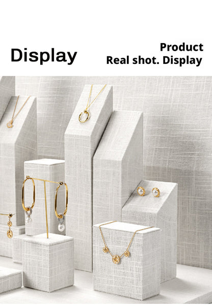 White Linen Jewelry Display Set with Multi-Level Risers for Vendors